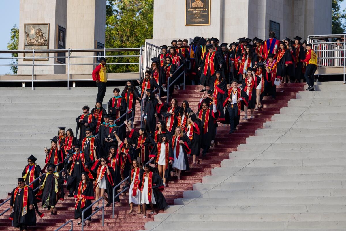 college graduate for short crossword