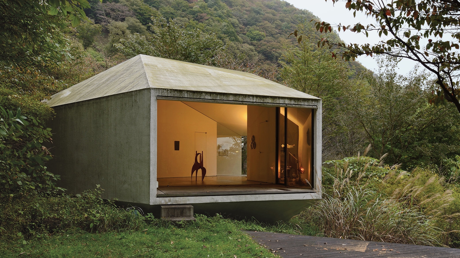sloped roofed homes crossword